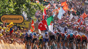 Jasper Philipsen avoids disaster in sprint for Tour de France third stage win