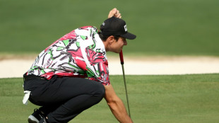 Hovland sets the pace as Tiger toils at the Masters