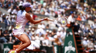 Swiatek and Sabalenka set up French Open semi-final clash as Alcaraz sweeps through