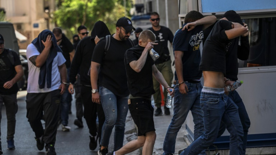 Forty charged after fatal stabbing of Greek football fan
