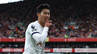 Son double holds Arsenal, Liverpool cut Man City's Premier League lead