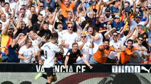 Valencia stun Atletico as Duro hits two