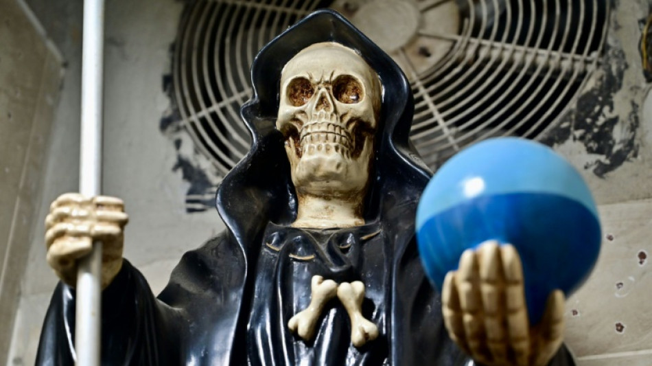 Ecuadoran drug gangs turn to death saint for protection