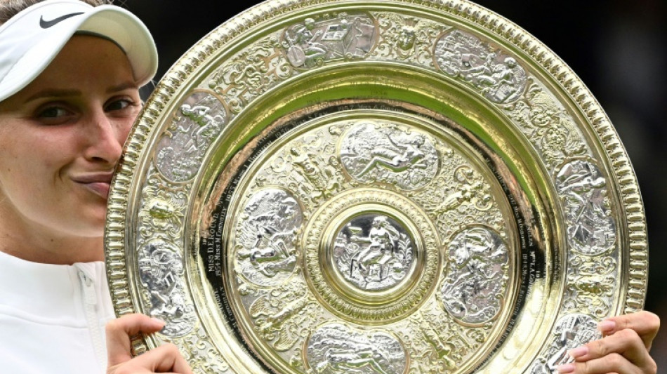 Unseeded Vondrousova stuns tearful Jabeur to win Wimbledon title