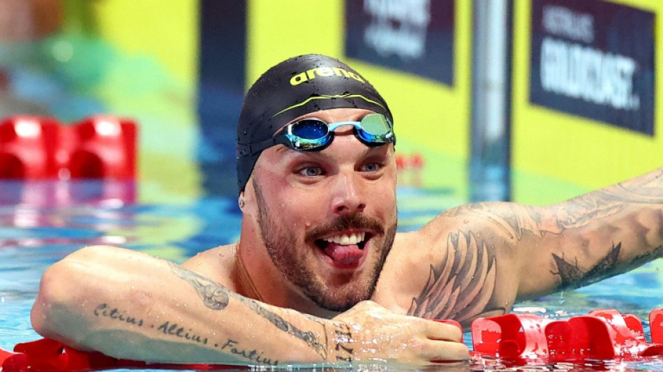 Swim star Chalmers hopes going public with mental health battles helps others