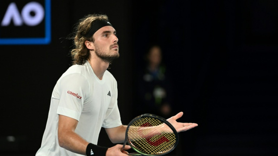 Tsitsipas survives five-set test to make Australian Open quarters