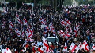 Georgia ruling party wins local polls as mass protests flare