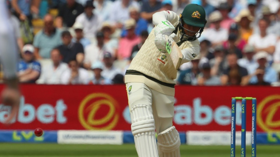 Ton-up Khawaja keeps England at bay in Ashes opener