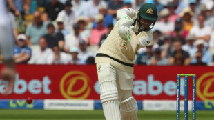 Ton-up Khawaja keeps England at bay in Ashes opener