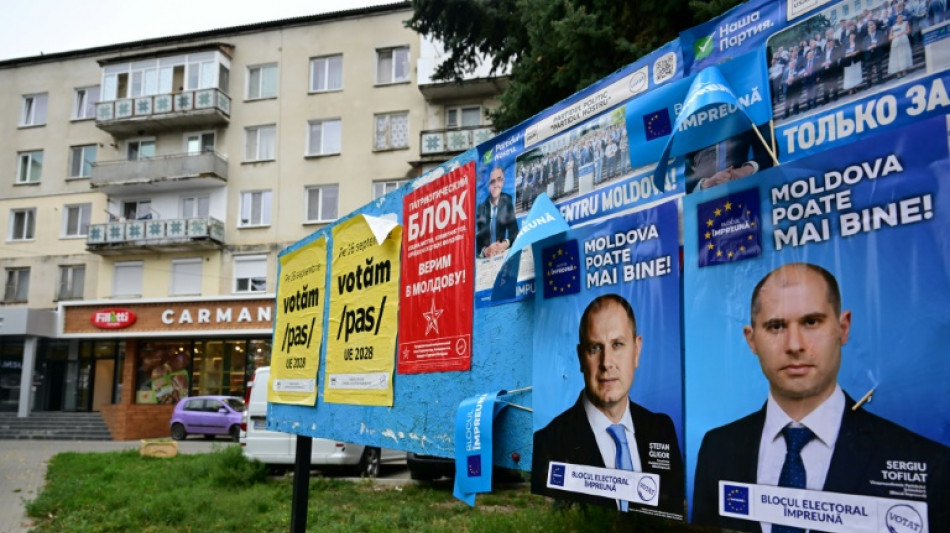 Moldovans torn between pro-EU and pro-Russia vote in tense polls