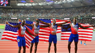 Lyles wins third world gold after anchoring US relay to victory