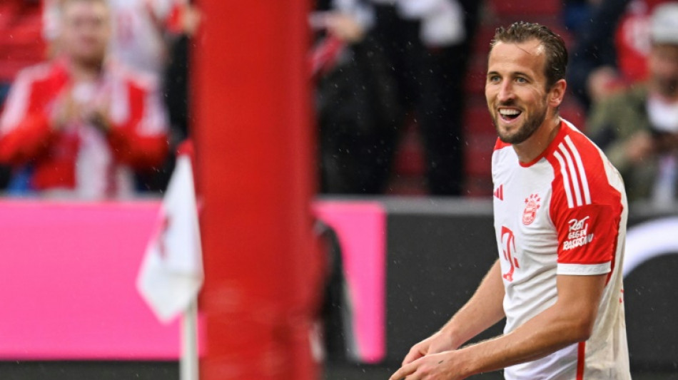 Kane scores twice on home Bundesliga debut as Bayern extend winning start