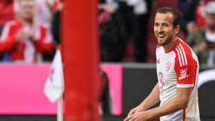 Kane scores twice on home Bundesliga debut as Bayern extend winning start