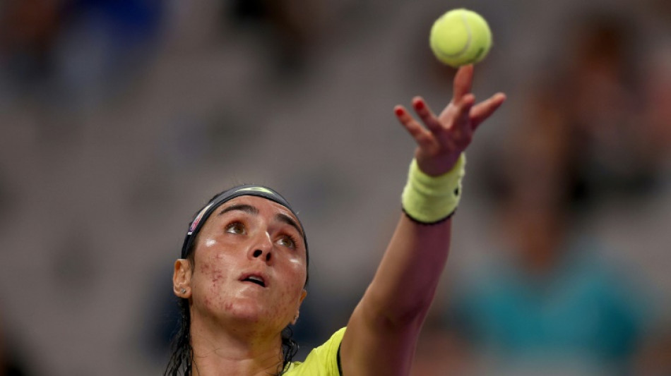 Jabeur rallies to keep WTA Finals bid on track