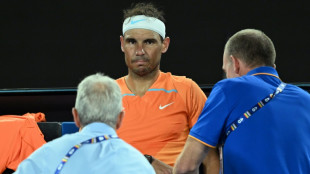 Nadal makes stunning early Australian Open exit as more rain falls