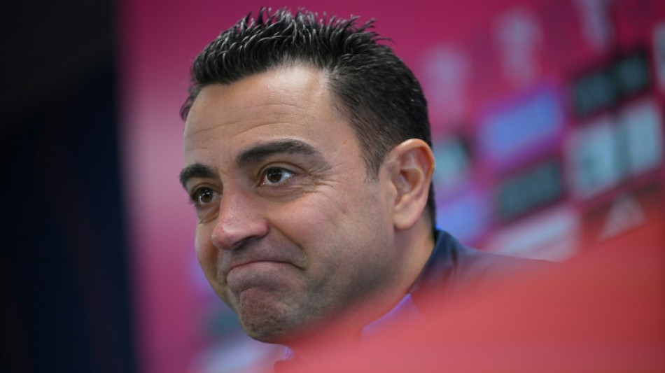 Xavi expecting 'wounded' Madrid to wage war in cup Clasico