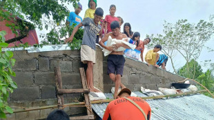 Dif&iacute;ciles operaciones de rescate por inundaciones en Filipinas, azotado por la tormenta Trami
