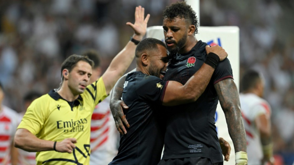 England labour to victory over Japan in World Cup