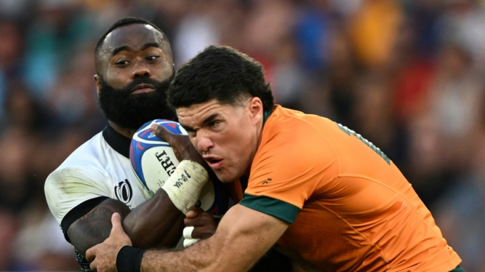 Jones rings changes at half-back for must win Wales clash