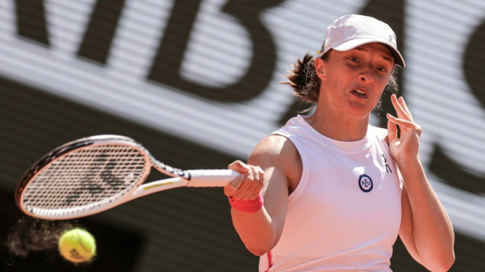 Swiatek thrashes Wang 6-0, 6-0 in 51 minutes to reach French Open last 16