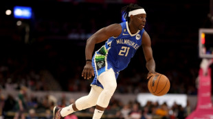 NBA Celtics land ex-Bucks guard Holiday from Portland