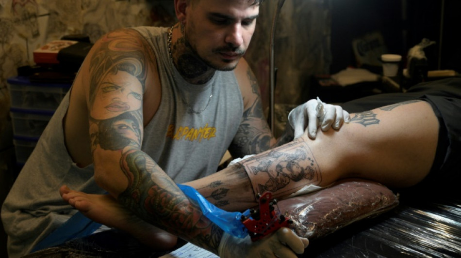 More than skin deep: Fans line up for Messi tattoos