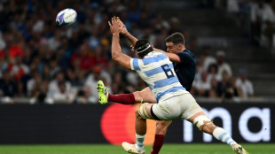 Ford kicks England past Argentina in World Cup opener